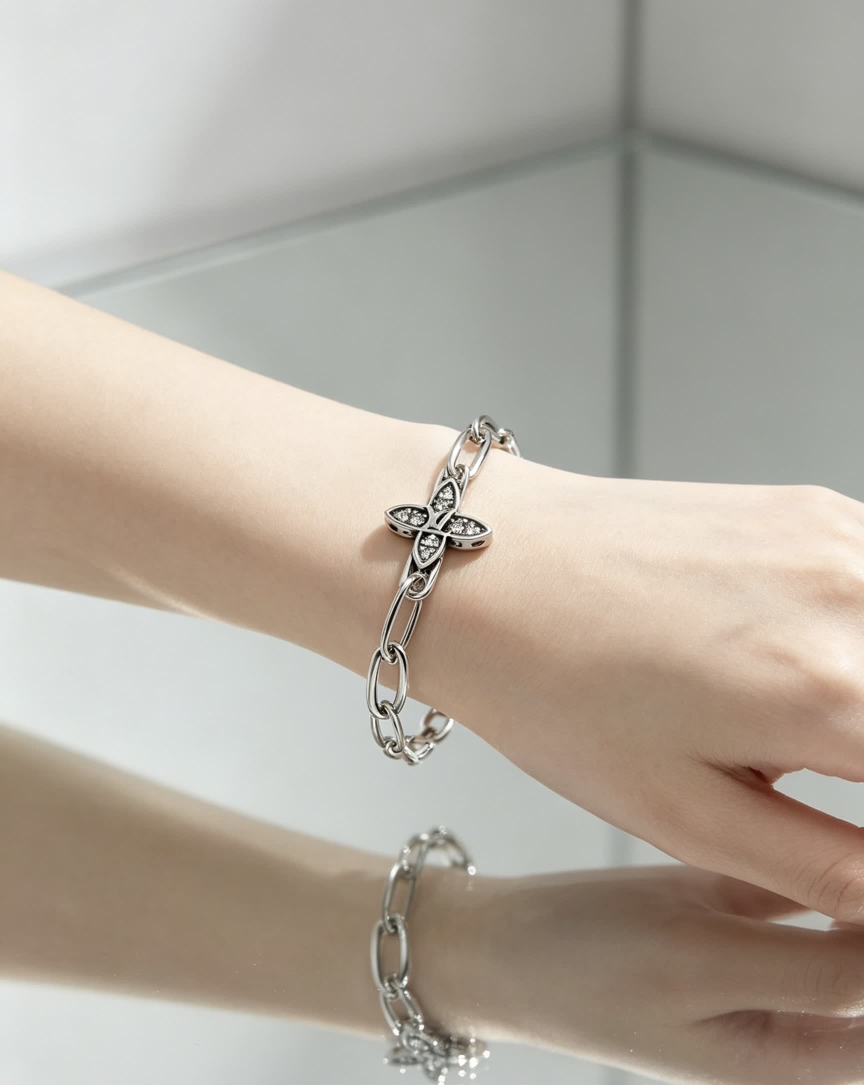 Louis Vuitton Silver Bracelet with Monogram Flower Charm
